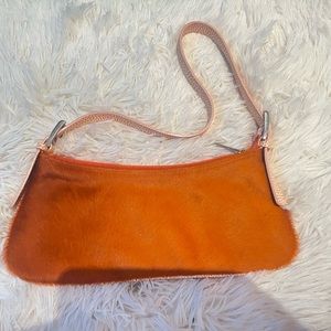 orange batycki fur purse